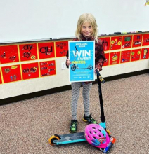 Kaisa Karlberg, an Apple Valley Elementary student, won a scooter and helmet 